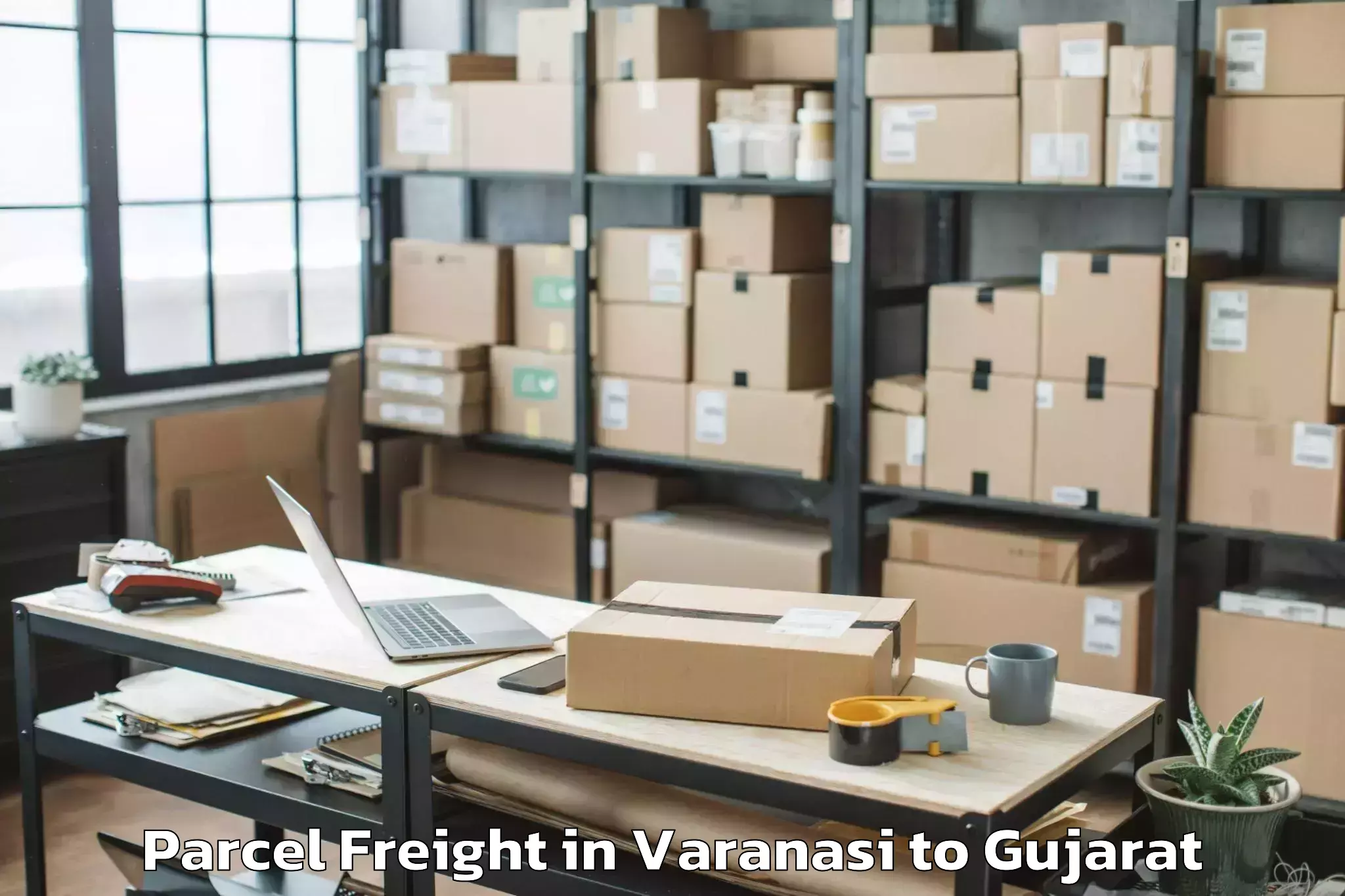 Easy Varanasi to Jambughoda Parcel Freight Booking